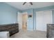 Cozy Bedroom featuring closet and dresser and an open doorway to the hallway at 486 Balsa Dr, Castle Rock, CO 80104