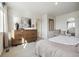 Bright bedroom with dresser and large window at 9854 Bahama St, Commerce City, CO 80022