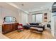 Bright living room with hardwood floors, stylish furniture, and natural light at 3880 W 13Th Ave, Denver, CO 80204