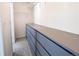Walk-in closet featuring a built-in dresser and ample shelving at 3353 Wabash St, Denver, CO 80238