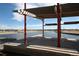 Scenic community park with a tranquil lake, walking paths, and shaded seating areas at 3353 Wabash St, Denver, CO 80238