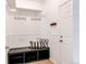 Functional mudroom with built-in storage, hooks, and ample space for organization at 3353 Wabash St, Denver, CO 80238