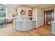 Eat-in kitchen wet bar area with modern finishes and wood floors at 758 Chimney Creek Dr # C, Golden, CO 80401