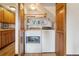 Convenient laundry area with washer, dryer, and ample storage space at 758 Chimney Creek Dr # C, Golden, CO 80401