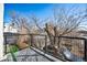 Balcony with black metal railing overlooking city at 1416 Pierce St, Lakewood, CO 80214