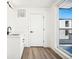 Bright bar area with modern sink and stylish design, steps away from a balcony at 1416 Pierce St, Lakewood, CO 80214