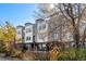 Modern 3-story townhome building with light gray and white exterior at 1416 Pierce St, Lakewood, CO 80214