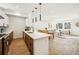 Open-concept kitchen flows into the dining and living areas, great for entertaining guests at 1416 Pierce St, Lakewood, CO 80214