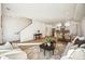 Spacious open-concept with stairs, modern kitchen, and a cozy living area at 1416 Pierce St, Lakewood, CO 80214
