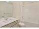 This bathroom features a single sink vanity, commode, and a shower over tub at 27694 E Byers Ave, Aurora, CO 80018