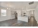 Spacious kitchen with stainless steel appliances, granite countertops, and an island perfect for entertaining at 27694 E Byers Ave, Aurora, CO 80018