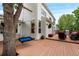 Enjoy outdoor living on this deck, complete with tree swing, outdoor seating, and a mounted outdoor television at 2795 Signal Creek Dr, Thornton, CO 80241