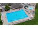 Enjoy this community pool with plenty of chairs and space to lounge at 2795 Signal Creek Dr, Thornton, CO 80241