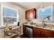 Bright kitchen features granite countertops, stainless steel appliances, and ample cabinetry at 1160 Wabash St, Denver, CO 80220