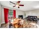 Bright dining area with wood floor and patio access at 12490 E Cornell Ave # 301, Aurora, CO 80014