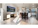 Spacious living area flows into dining and kitchen, featuring modern decor and natural light at 1312 Independence St # 3, Lakewood, CO 80215