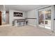 Finished basement showcasing a bar with seating and a sliding glass door leading to the outside at 17540 Caribou Dr, Monument, CO 80132