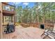 Multi-level deck perfect for outdoor entertaining with seating and a built-in slide at 17540 Caribou Dr, Monument, CO 80132