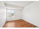 Bedroom with wood floors and window at 906 S Peoria St, Aurora, CO 80012