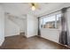 Bright living room with tile floors and view at 906 S Peoria St, Aurora, CO 80012