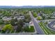 Aerial view showcases the neighborhood's lush greenery and the houses in the area at 5320 W 62Nd Ave, Arvada, CO 80003