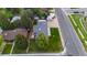 Aerial view features a home with a well-maintained lawn and fenced yard, also includes a hot tub at 5320 W 62Nd Ave, Arvada, CO 80003