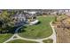 Lush green park featuring a playground, walking paths, and covered picnic areas for outdoor enjoyment at 5320 W 62Nd Ave, Arvada, CO 80003