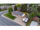 This aerial view showcases the home, landscaping, and RV parking at 5320 W 62Nd Ave, Arvada, CO 80003