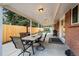 This covered patio is perfect for outdoor dining and entertaining guests at 5320 W 62Nd Ave, Arvada, CO 80003