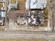 Aerial view showcases rooftops, solar panels, and a brick patio amid neighborhood streets at 4000 Irving St, Denver, CO 80211