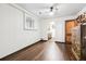 Cozy room with wood floors, fan, and bright window light at 4000 Irving St, Denver, CO 80211