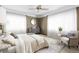 Bright primary bedroom with neutral tones, large windows, and sitting area at 4000 Irving St, Denver, CO 80211