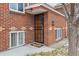 Charming brick house featuring a secure front door and welcoming entrance at 4000 Irving St, Denver, CO 80211