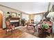 Inviting living room featuring a cozy fireplace, hardwood floors, and ample natural light at 4000 Irving St, Denver, CO 80211