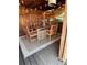 Covered patio with an outdoor dining table, chairs, and decor at 4000 Irving St, Denver, CO 80211