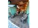Outdoor patio with chairs and table, perfect for entertaining guests or relaxing outdoors at 4000 Irving St, Denver, CO 80211