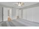 Comfortable bedroom with closet space and carpet flooring at 3872 S Fraser St # O03, Aurora, CO 80014