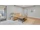 Inviting living room with a sliding glass door and a comfortable sofa at 3872 S Fraser St # O03, Aurora, CO 80014