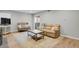 Bright living room with neutral tones and a sliding glass door for natural light at 3872 S Fraser St # O03, Aurora, CO 80014