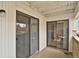 Enclosed outdoor patio with sliding glass doors providing access to the interior space at 3872 S Fraser St # O03, Aurora, CO 80014