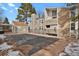 Community pool area with a closed pool, surrounded by residential buildings and a small pool house at 3872 S Fraser St # O03, Aurora, CO 80014