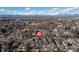 Aerial view of neighborhood featuring mature trees, residential homes and mountain views at 858 S Emerson St, Denver, CO 80209
