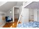 Bright bedroom featuring a chair, closet and hardwood floors at 858 S Emerson St, Denver, CO 80209