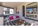 Cozy front porch with comfortable seating and view of the front yard at 858 S Emerson St, Denver, CO 80209