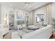Bright living room with stylish furniture, hardwood floors, and recessed lighting at 858 S Emerson St, Denver, CO 80209