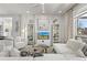 Bright living room with stylish furniture, hardwood floors, and recessed lighting at 858 S Emerson St, Denver, CO 80209