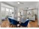 Inviting living room featuring hardwood floors, large windows, and comfortable seating at 858 S Emerson St, Denver, CO 80209