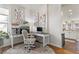 Bright home office featuring a classic desk, stylish decor, and natural light at 858 S Emerson St, Denver, CO 80209