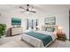 Stylishly furnished bedroom with modern decor and ample natural light at 12690 W Brandt Dr, Littleton, CO 80127
