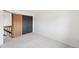 Carpeted bedroom features a closet and neutral walls at 12690 W Brandt Dr, Littleton, CO 80127